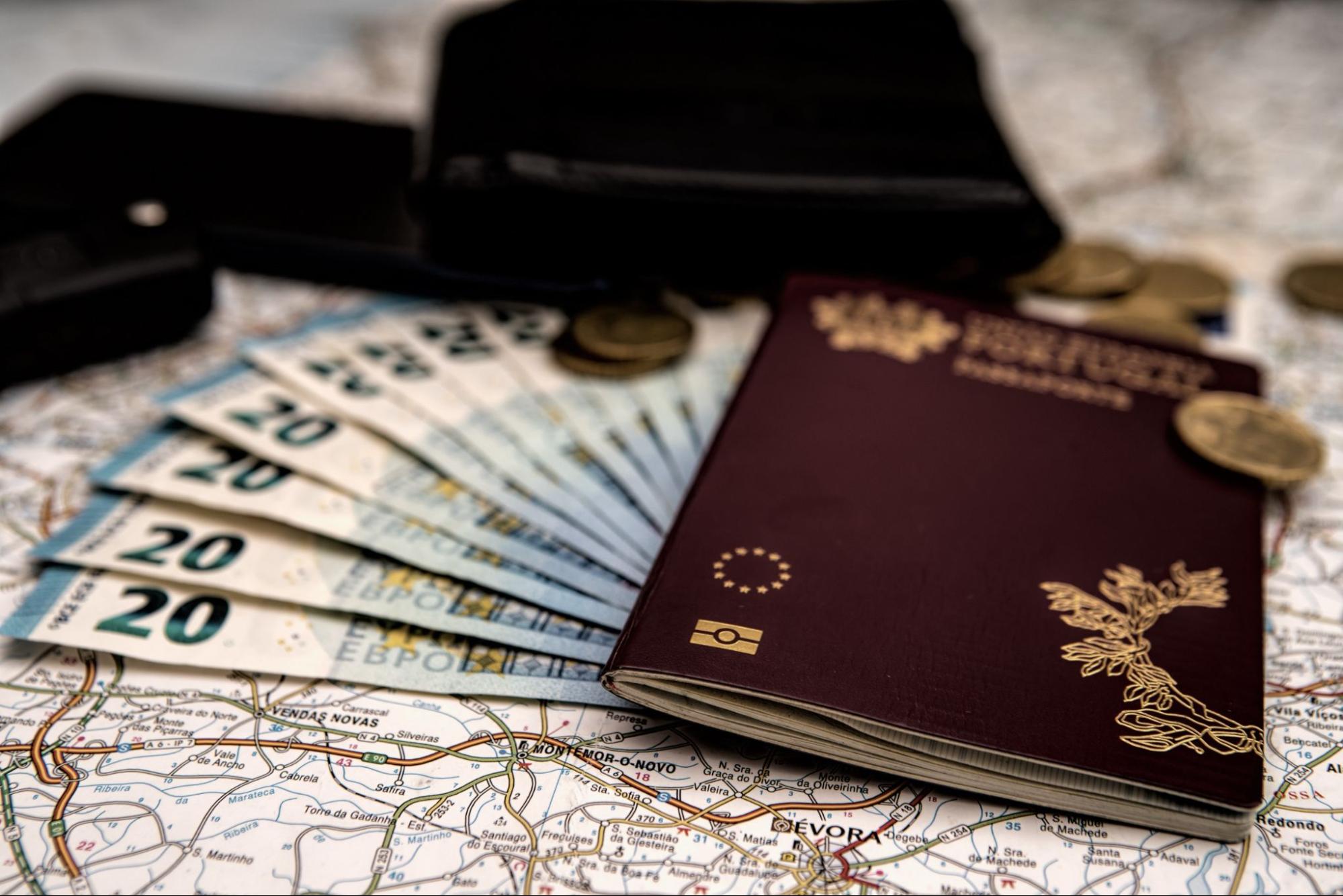 biometric passport with Euro currency with a map for a background