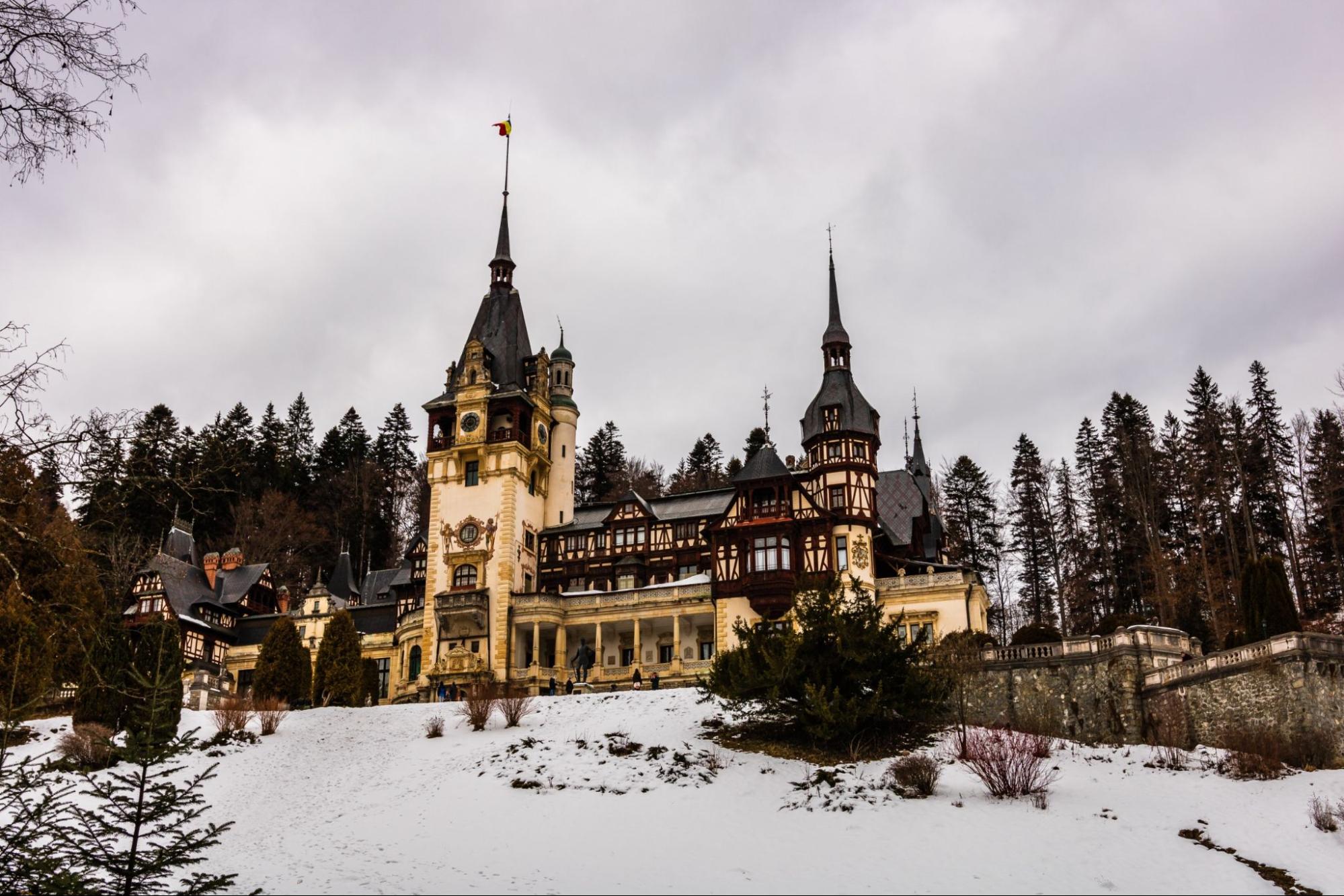 Peles Castle in a cloudy day of winter, the most famous royal castle of Romania, Romanian landmark