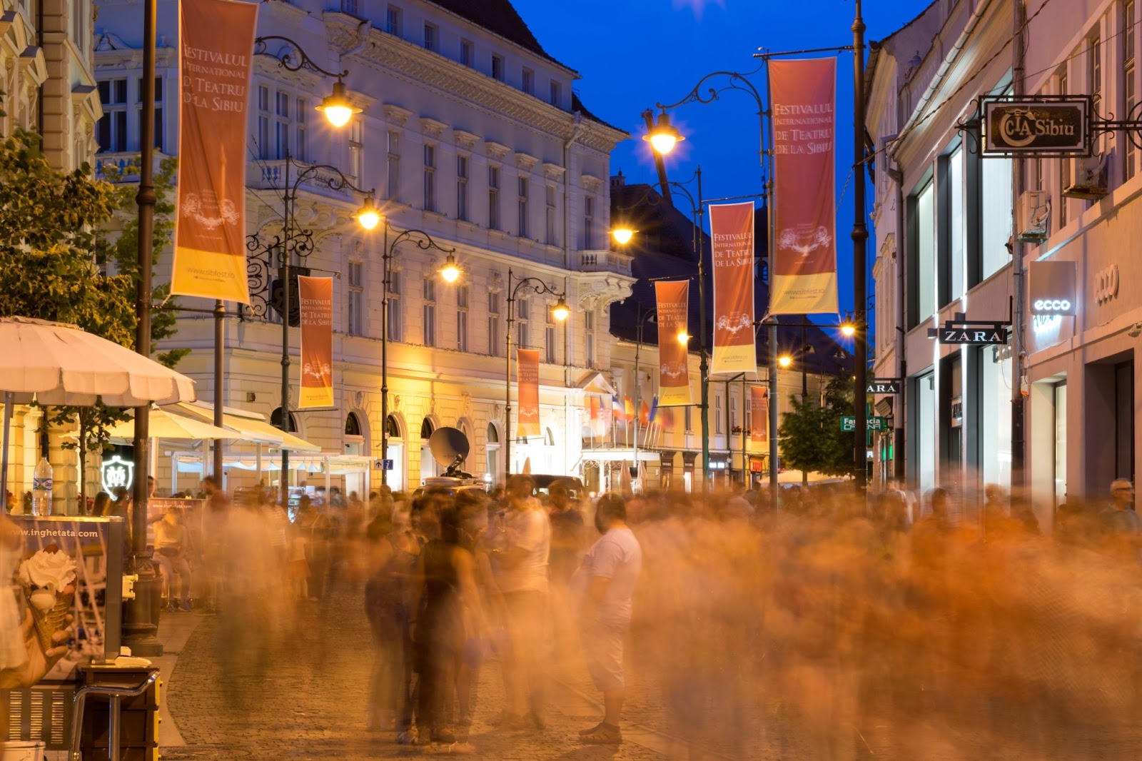 People passing by on a pedestrian walkway during Sibiu International Theatre Festival, Sibiu, Romania