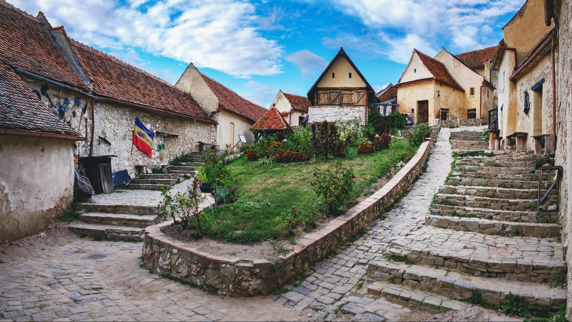 Rasnov Fortress with beautiful medieval stone houses and stone stairway, Brasov county, Romania. Panoramic view